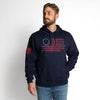Man wearing a navy hoodie with American flag design on a white background