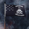 Pirate flag with skull and crossbones design against a dark, smoky background