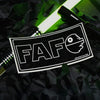 Sticker with 'FAFO' logo on a dark background