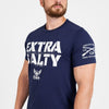 Man wearing a navy blue t-shirt with 'Extra Salty' and 'Grunt Style' text on a white background