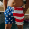 Person wearing a swimsuit with American flag design outdoors