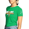 Green t-shirt with 'Magically Delicious' design worn by a person on a white background