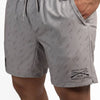 Gray shorts with a pattern and branding on a white background