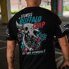 A man viewed from behind wearing a black graphic t-shirt with a large buffalo skull and motorcycle design on the back, featuring the text 'STURGIS BUFFALO CHIP' and 'BEST PARTY ANYWHERE!'.