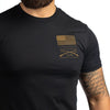 Black t-shirt with gold graphic design on a white background