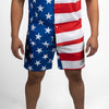American flag patterned shorts worn by a person on a white background
