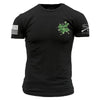 Black t-shirt with green and white graphics on a white background
