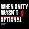 A black graphic print with distressed white text reading 'WHEN UNITY WASN'T OPTIONAL' and smaller white text below reading 'SEPTEMBER 11 25 YEARS', with a red vertical bar and red horizontal underline accent.