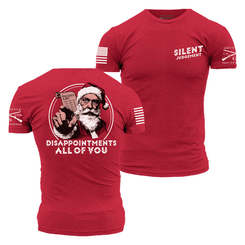A heather red short-sleeve t-shirt shown from both front and back. The front features 'SILENT JUDGEMENT' printed on the left chest, and the back features a large graphic of a grumpy Santa Claus holding a sack and pointing, with the text 'DISAPPOINTMENTS ALL OF YOU' below.