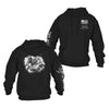 Two black hoodies shown on a plain white background: one front view with a large white skull-and-flag graphic on the chest and vertical white text down one sleeve, and one back view with a small white American flag and crossed rifles graphic on the upper back.