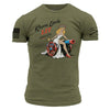 Green t-shirt with graphic design of a woman with a cannon and text on a white background