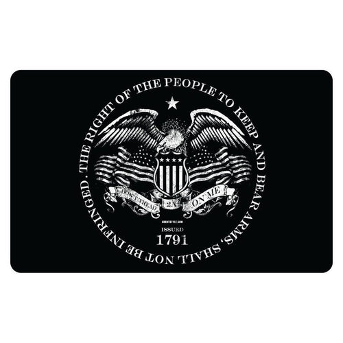 A black rectangular mat or plaque with rounded corners, featuring a large white circular emblem of an eagle, shield, and crossed rifles, surrounded by the text 'THE RIGHT OF THE PEOPLE TO KEEP AND BEAR ARMS SHALL NOT BE INFRINGED' and 'ISSUED 1791'.