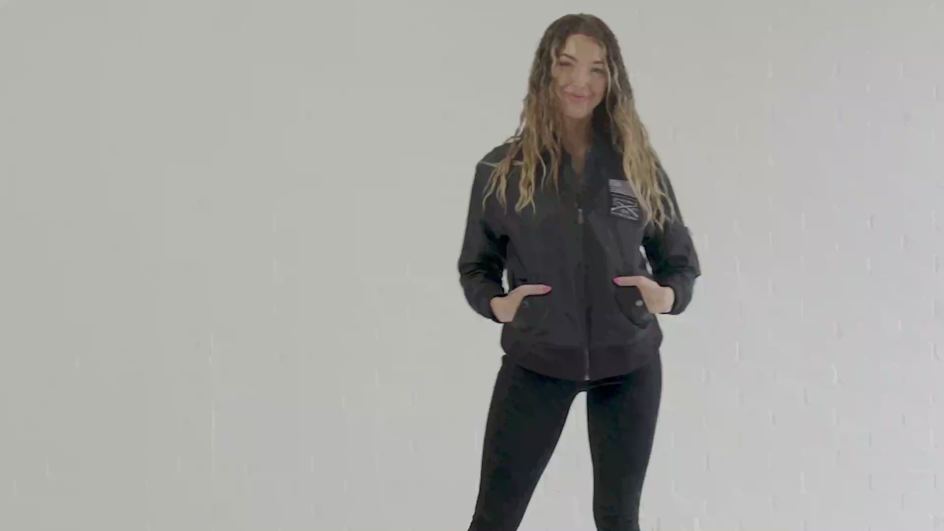 Model shows the Women's Stealth Bomber Jacket Features