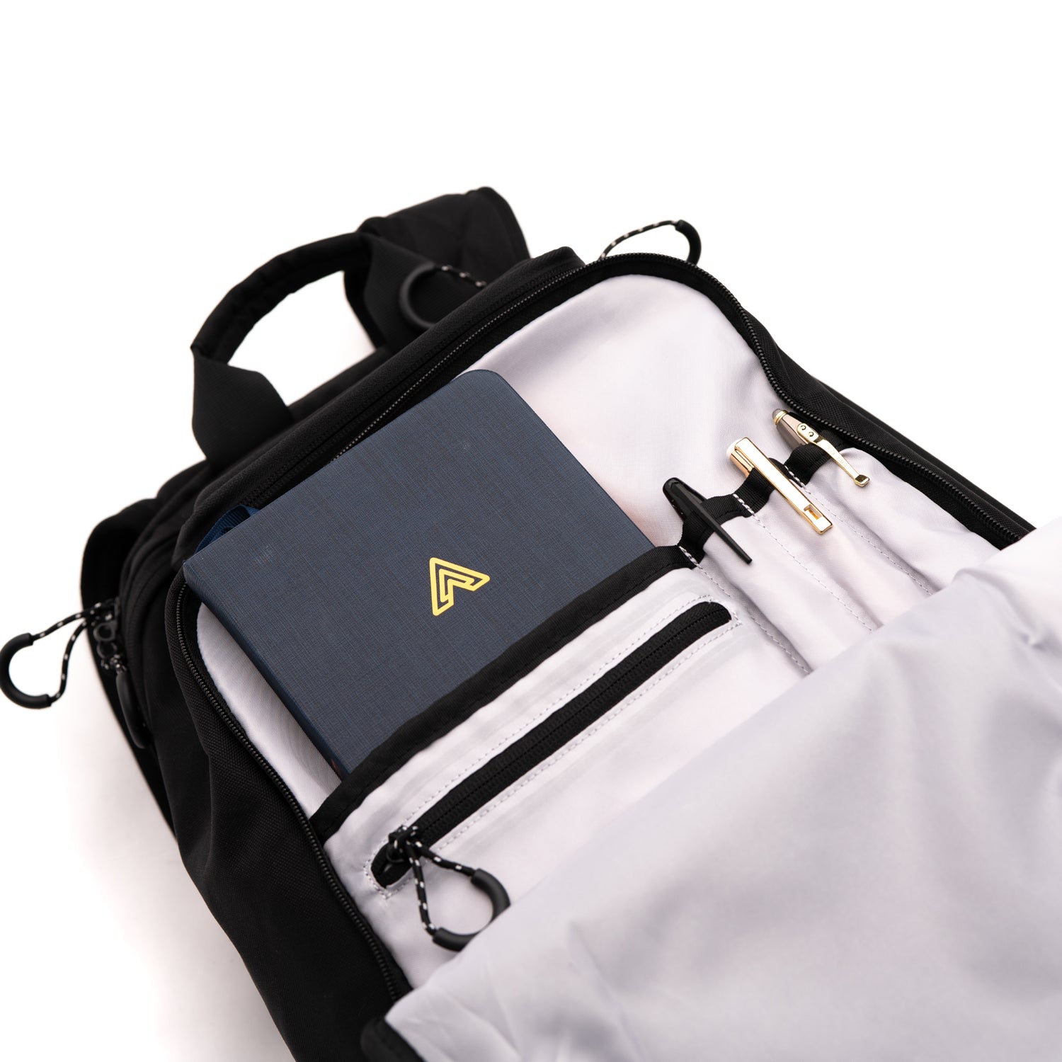 The front pocket of the EDC Elite Backpack is perfect for travel and carrying items like a passport and pens